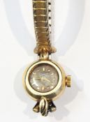 Lady's gold Ulysse Nardin bracelet watch, the case marked 14K,