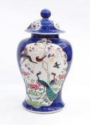 Chinese porcelain baluster vase and cover having low domed lid with ball knop,