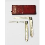 Georgian silver folding fruit knife and fork set with banded mother-of-pearl handles,