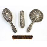 20th century four-piece silver dressing table set comprising hand mirror, hair brush,