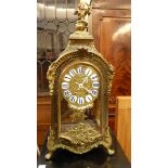 French brass inlaid and ebonised mantel clock having winged cherub finial,