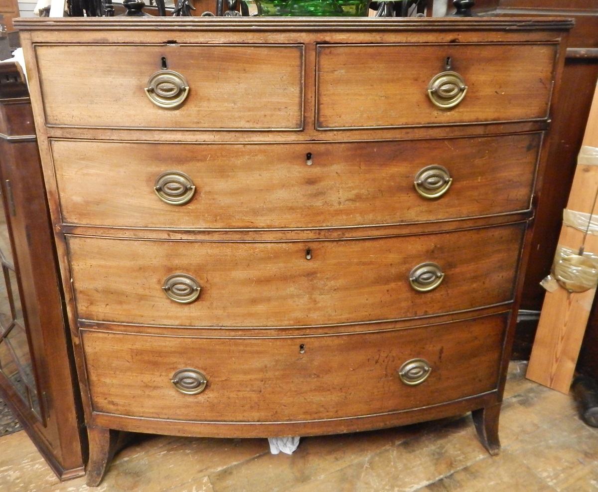 Georgian mahogany bowfront chest of two short and three long graduated drawers,