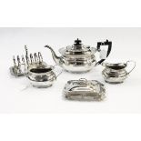 Quantity of assorted silver plate including a three-piece teaset, toast racks,