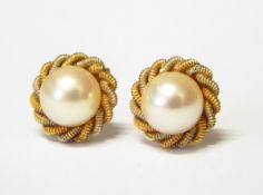 Pair of 18ct gold and pearl stud earrings,