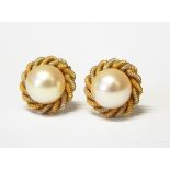 Pair of 18ct gold and pearl stud earrings,