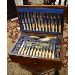 Canteen of silver plated flatware of stylised dog nose design, comprising 12 table knives and forks,