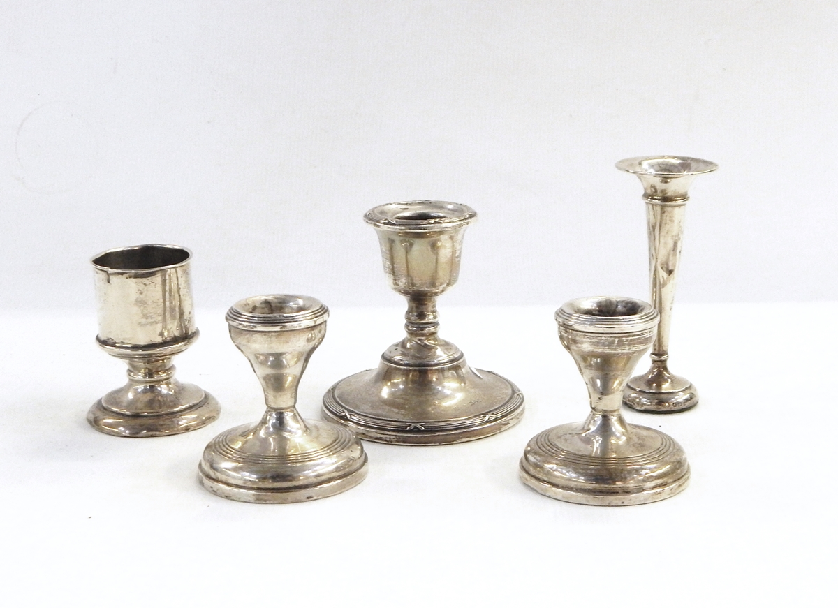 Pair of silver dressing table candlesticks of plain circular form,