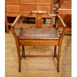 Mahogany piano stool with inlaid and painted splat to the shaped back and arms, leather seat,