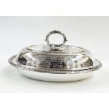 Victorian silver plated entree dish and cover of oval form with engraved decoration including a