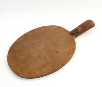 Robert Thompson of Kilburn Mouseman oak cheese board of oval form with carved mouse signature to