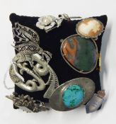 Nine silver and metal brooches including marcasite and hardstone set