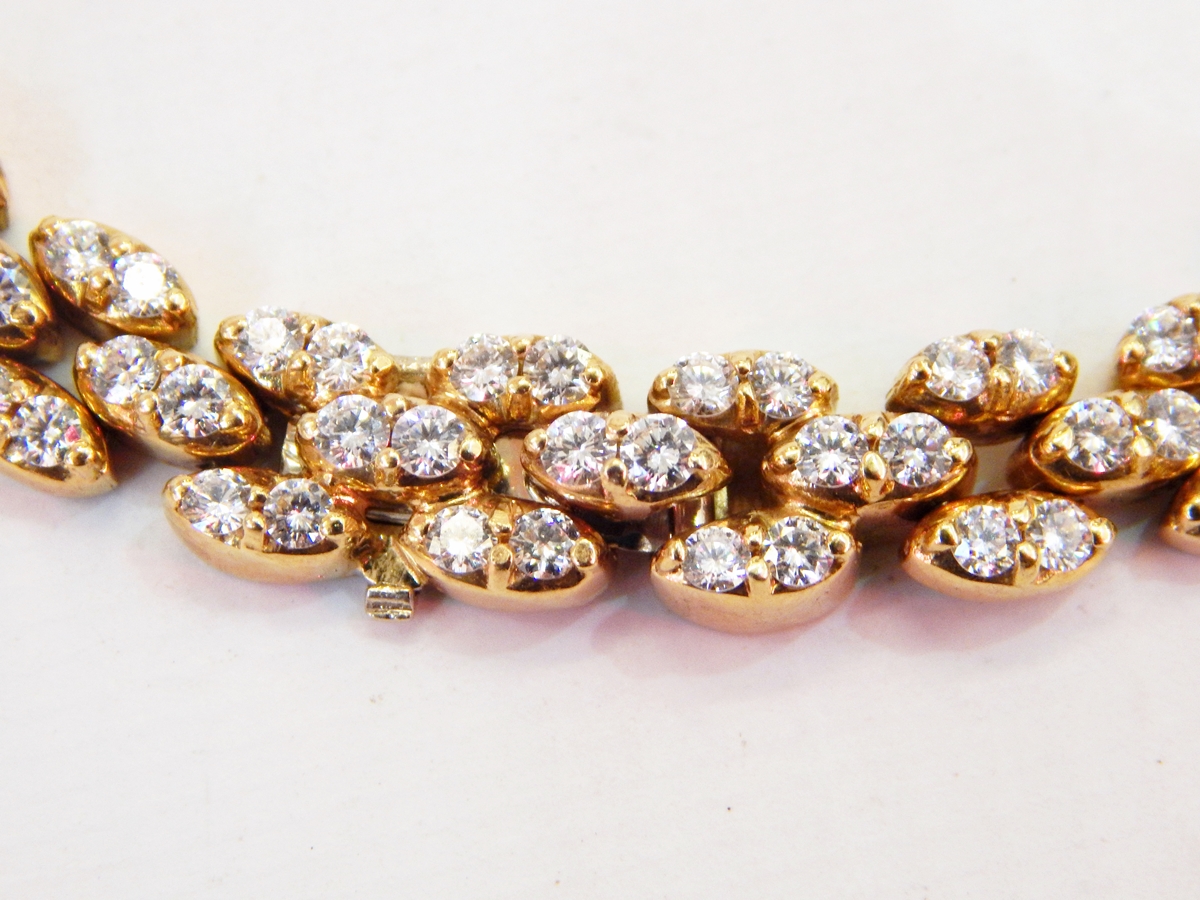 18ct gold and diamond collar necklace, having three interlinked rows of almond-shaped links, - Image 3 of 3
