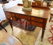 Mid 19th century mahogany kneehole writing table having an arrangement of five drawers,