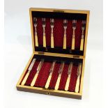 Set of six silver plate 'Kings' pattern soup spoons (boxed) together with part set of six silver