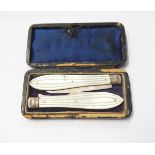 Victorian silver folding fruit knife and fork set with fluted mother-of-pearl handles,