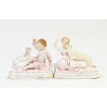 Pair of continental porcelain figure groups of young boy and girl with dog on octagonal bases,