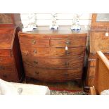 George III figured mahogany bowfronted chest of two short and three long graduated drawers,