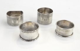 Four assorted silver napkin rings