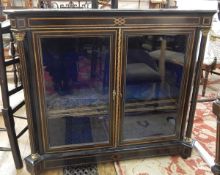 Victorian ebonised kingwood and gilt brass-mounted side cabinet enclosed by glass panelled doors,