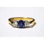 18ct gold, sapphire and diamond three-stone ring,