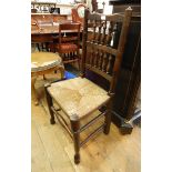 19th century Lancashire spindle back chair with rush seat and Eastern stained wood brass-topped