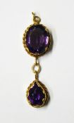 18ct gold and amethyst pendant the oval mixed cut amethyst with pear-shaped amethyst drop beneath,