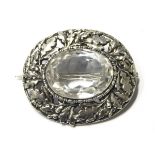 Arts & Crafts silver brooch of oval form,