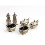 Silver six-piece condiment set comprising a pair of mustard pots,