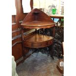 Mahogany corner washstand with removable top to reveal hole for basin, scalloped apron,