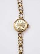 Lady's 9ct gold Bentina bracelet watch on 9ct gold chevron link bracelet