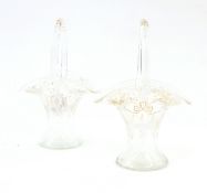 Pair cut and gilded glass baskets with hoop handles