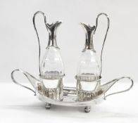 Late Georgian plated two bottle stand boat shaped and beaded,