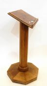 Oak lectern, the rectangular top on octagonal column and base,