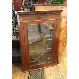 19th century mahogany corner cabinet with dentil cornice, astragal-glazed door with three shelves,