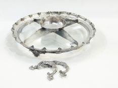 Silver plated serving dish of circular form with glass base and central divider,