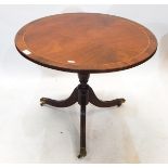 Reproduction Regency style mahogany tripod occasional table