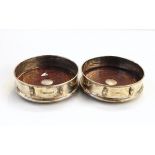 Pair of modern Britannia standard silver wine coasters by Francis Howard Limited,