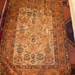An Asfshar wool rug with traditional mot