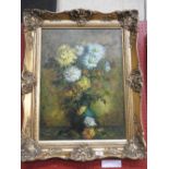 An oil on canvas, signed Holman, of a vase of flowers in a gilt frame. 60 x 44cm