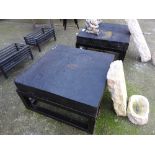 A pair of bulk stone lamp tables on a square section ebonised base 72x72cm, 40cm high