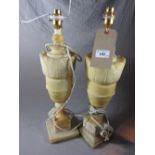A pair of C20th alabaster table lamps on square plinth bases. (2). H49cm.