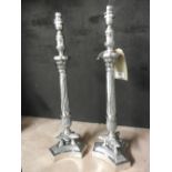 Pair of silver plated Empire style table lamps on triform bases