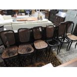 A set of six early 20th century Thonet ebonised dining chairs with caned seats and backs (AF) (6)