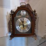 A fruitwood bracket clock by Hermle with gilt metal mounts and Westminster chime