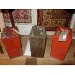 Two vintage 1920's petrol cans and a similar aviator fuel can