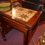 A retro teak nest of three low table with inset tile tops