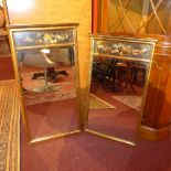 A pair of gilded pier mirrors with printed still life detail