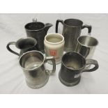 Seven pewter tankards including a quart jug from the Green Dragon, Stepney and a two handled tankard