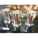 A set of three silvered metal wine coolers with twin handles (3)