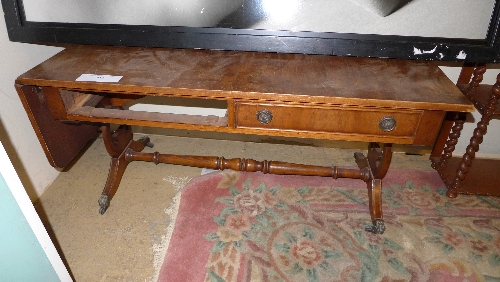 A 20th Century yewwood low sofa table in the Regency manner 50cm x 100cm x 50cm.